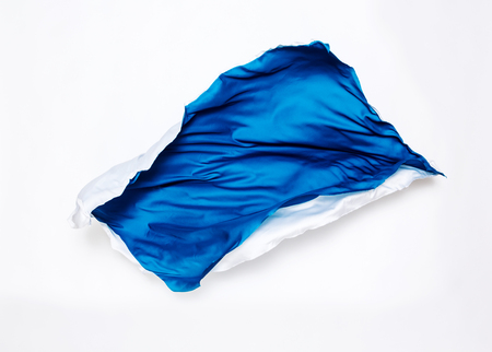 abstract pieces of blue and white fabric flying, design elementの写真素材