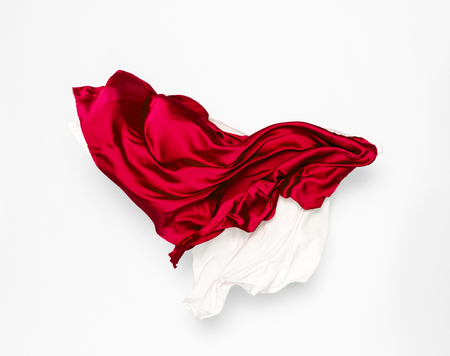 abstract pieces of red and white fabric flying, design elementの写真素材