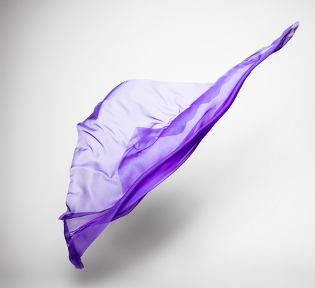 abstract piece of purple fabric flying, art object, design elementの写真素材