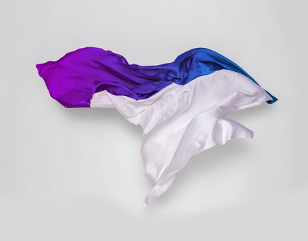 abstract pieces of multicolored fabric flying, high-speed studio shotの写真素材