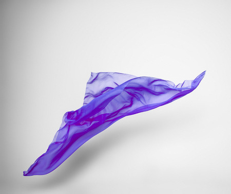 abstract piece of purple fabric flying, art object, design elementの写真素材