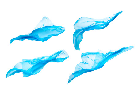 abstract piece of blue fabric flying, high-speed studio shotの写真素材