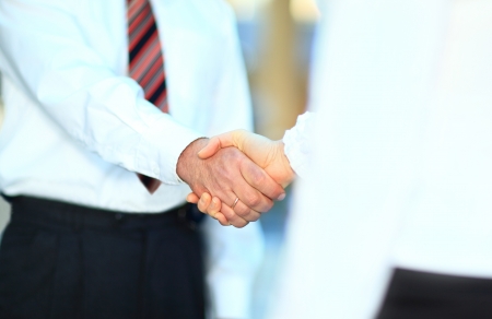 handshake isolated on business backgroundの写真素材