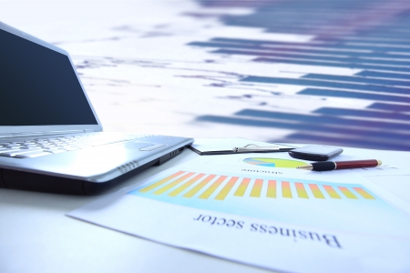 Graphs, charts, business table. The workplace of business peopleの写真素材