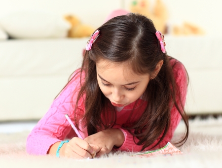 Beautiful girl draws.の写真素材