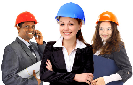 Two women and a man architect team. Isolated on a white background.の写真素材