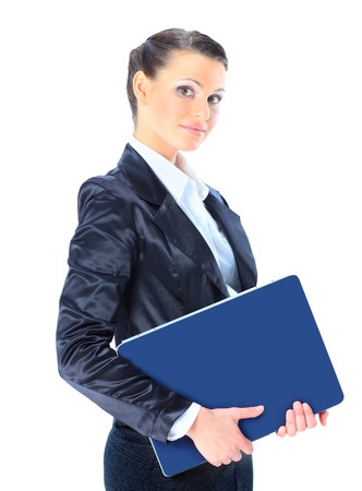 Beautiful young female entrepreneur holding laptop against white background.の写真素材