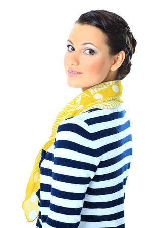 Beautiful woman with a yellow scarf.の写真素材