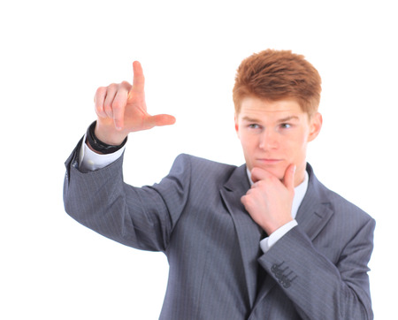 The young handsome businessman isolated on a white background.の写真素材