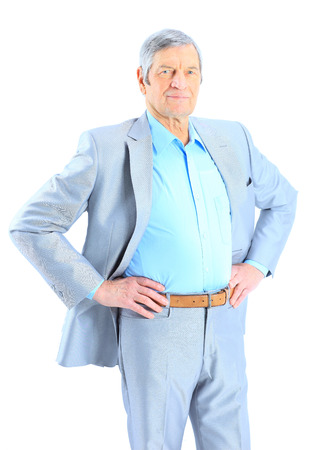 Closeup portrait of a smart senior man smiling の写真素材