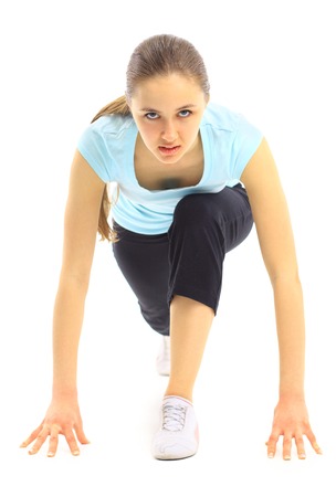 The beautiful sports girl íâ a white backgroundの写真素材