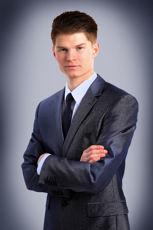 young business man isolated on white background の写真素材