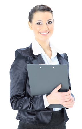 Beautiful businesswoman holds a work plan. Isolated on a white background.の写真素材
