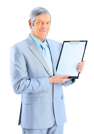 Nice businessman at the age, shows the plan of work. Isolated on a white background.の写真素材