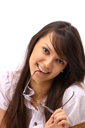 The beautiful business woman with glasses on a white backgroundの写真素材