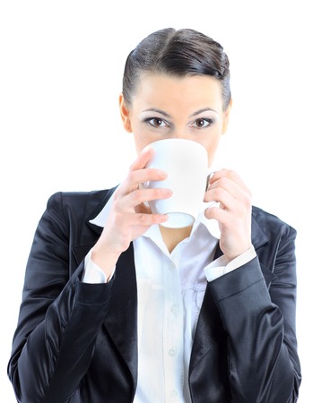 Nice business woman with a cup of coffee. Isolated on a white background.の写真素材