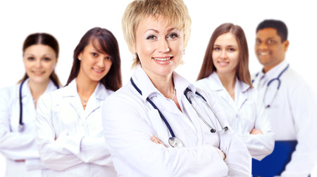 Portrait of group of smiling hospital colleagues standing togetherの写真素材