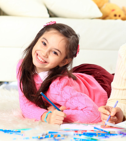 Beautiful girl draws.の写真素材