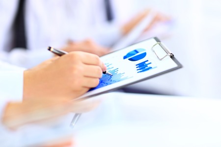 Businessman working with documents in the officeの写真素材
