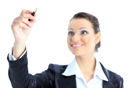 Beautiful business woman wrote pen in the air. Isolated on a white background.の写真素材