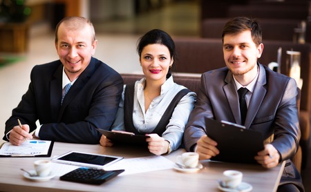 Business team working together to achieve better resultsの写真素材