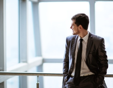 Portrait of a smiling handsome businessmanの写真素材