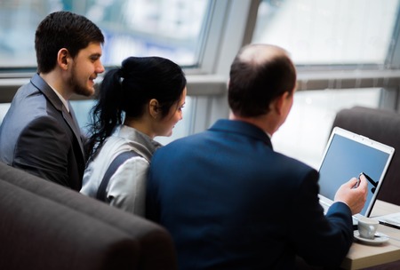 Business team working together to achieve better resultsの写真素材