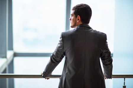 Portrait of a smiling handsome businessmanの写真素材