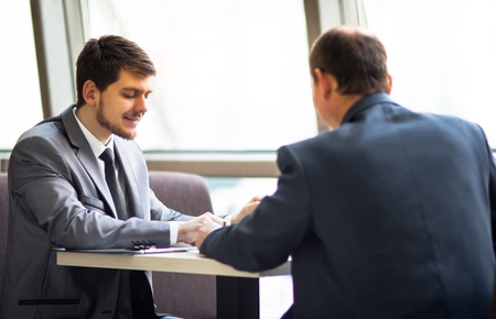 Business team working together to achieve better resultsの写真素材