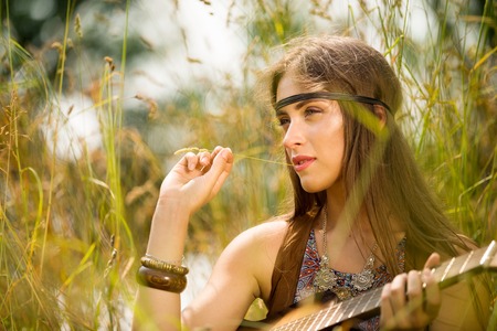 beautiful woman with guitarの写真素材