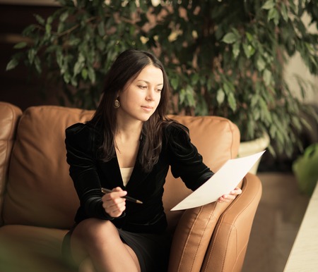 successful business woman working with documents in officeの写真素材