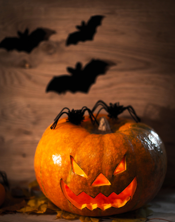 Halloween pumpkin head jack lantern on wooden backgroundの写真素材