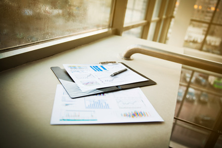 Drawings and charts of successful business, workplace of the businessman