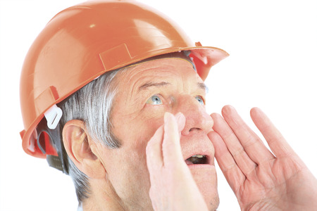 Engineer at the age of screams. Isolated on a white background.の写真素材