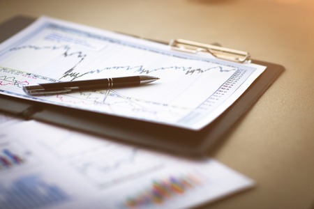 Drawings and charts of successful business, workplace  a businessman in  modern officeの写真素材