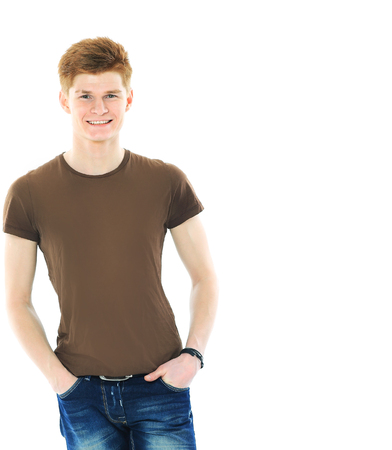 Portrait of handsome young man in casual clothes standing overの写真素材