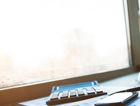 Modern workplace with digital tablet computer and mobile phone