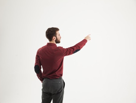 rear view - a successful Manager of a pointing hand on the blankの写真素材