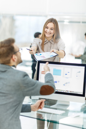 leading specialist of Finance and Manager of the company working with financial charts in the companys profitの写真素材