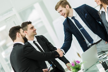 handshake of business partners after signing the contract in theの写真素材