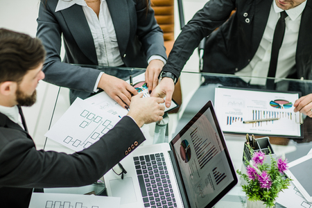 handshake business partners after discussion, the financial scheの写真素材