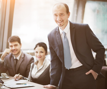 Business team working together to achieve better results, in the officeの写真素材