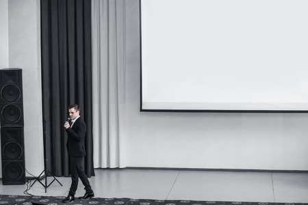 speaker conducts the business of the conference in the modern conference roomの写真素材