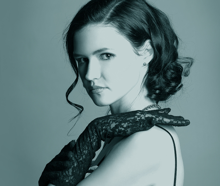 portrait of stylish young woman.isolated on gray background
