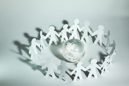 business concept.a large team of paper men standing around theの写真素材