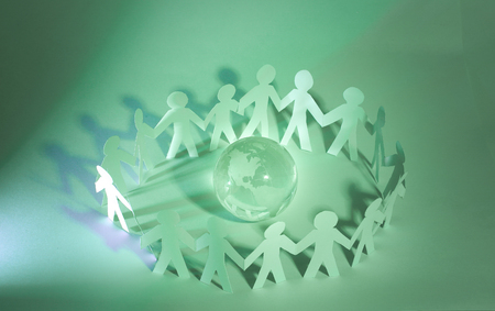 business concept.a large team of paper men standing around theの写真素材