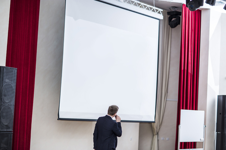 speaker conducts the business of the conference in the modern conference roomの写真素材