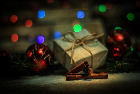 Christmas gift and Christmas tree decorations on the backgroundの写真素材