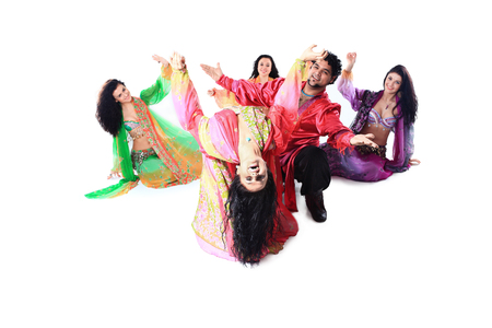 professional dance troupe of Gypsies in traditional dress performs folk dance