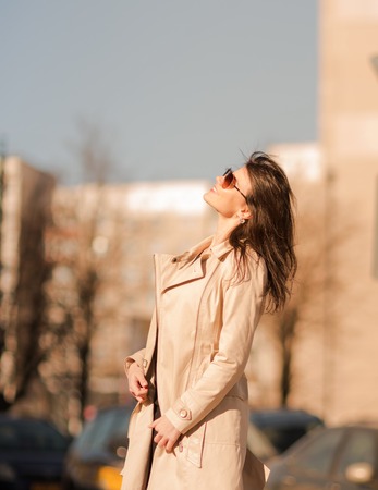 confident business woman on the background of the big cityの写真素材